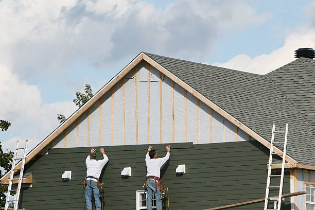 Professional Storm Damage Siding Repair technician working in Mayesville, SC